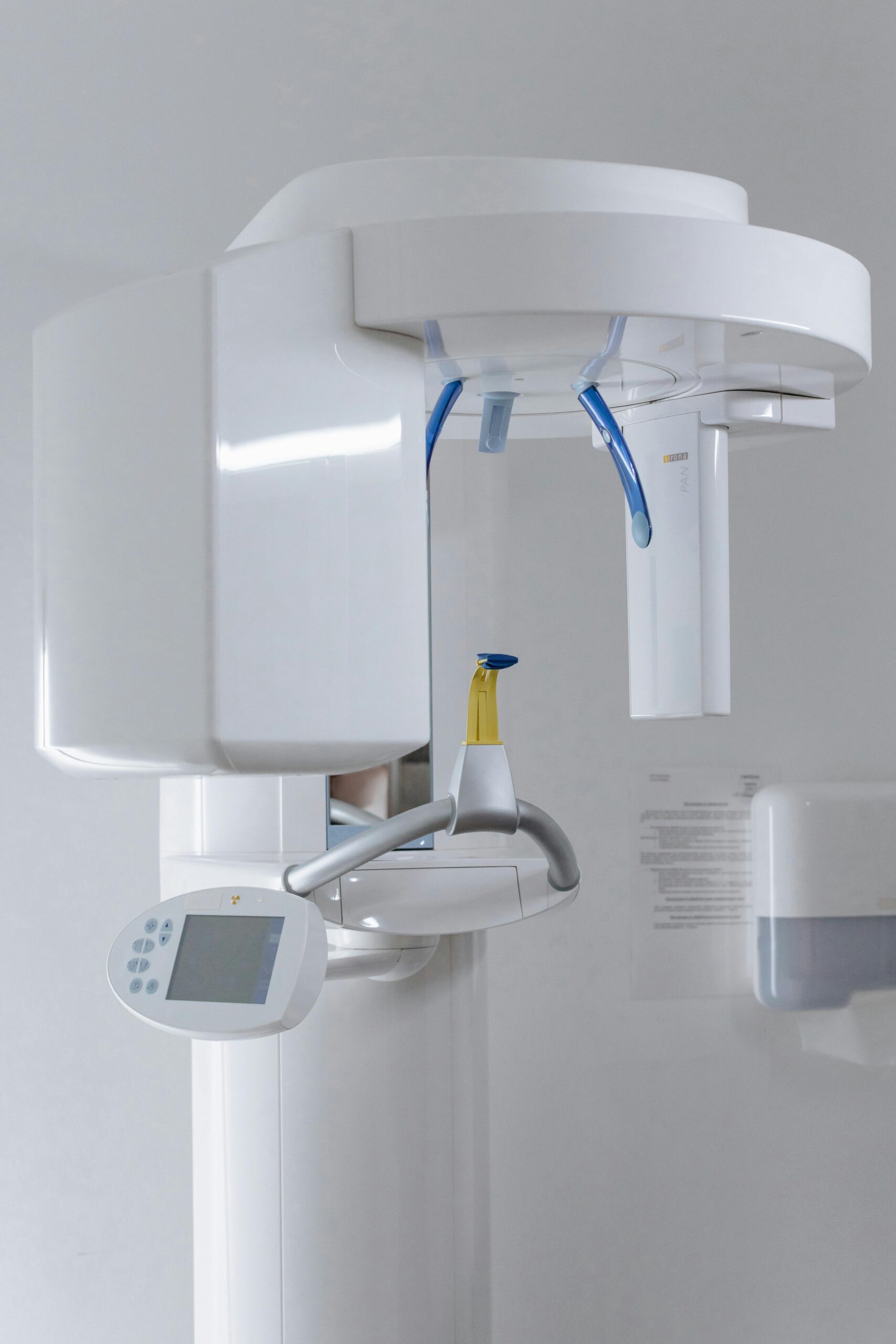 Dental imaging machine in a clinic setting, ideal for dental practices.