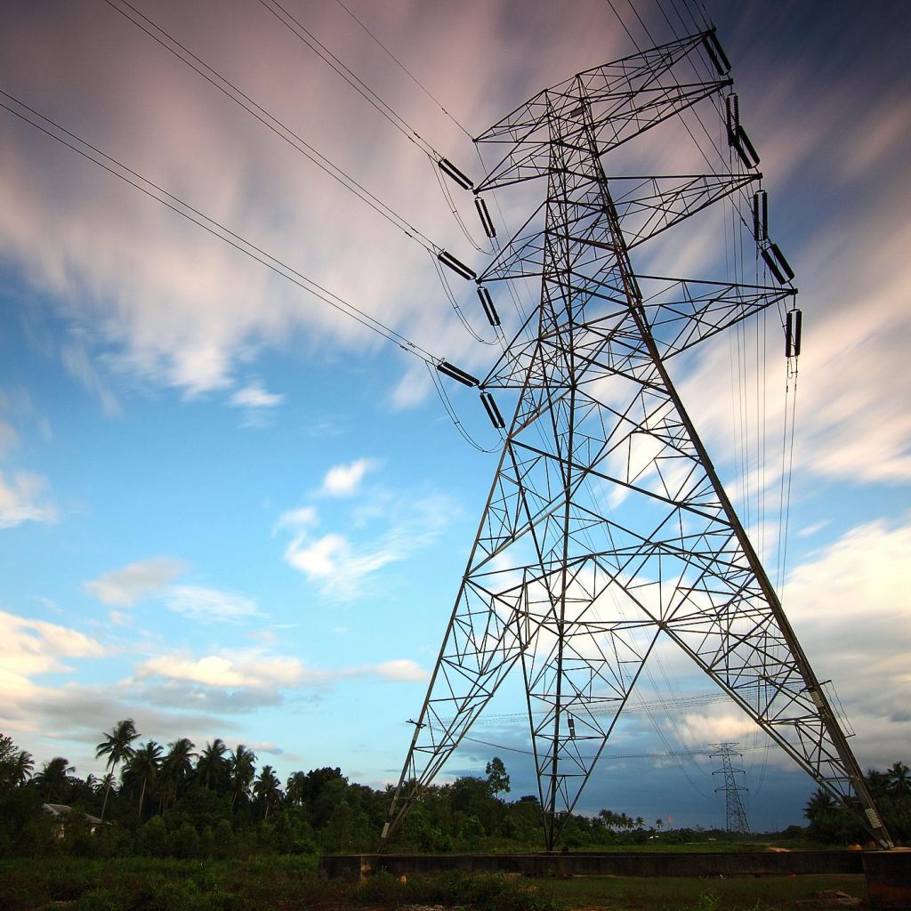 pexels photo 157827 157827 Stunning view of a towering power line against a vibrant sky, showcasing energy infrastructure in nature.
